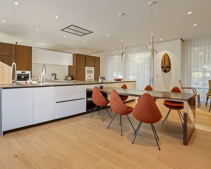 Open kitchen and dining, where the evening begins and lingers.